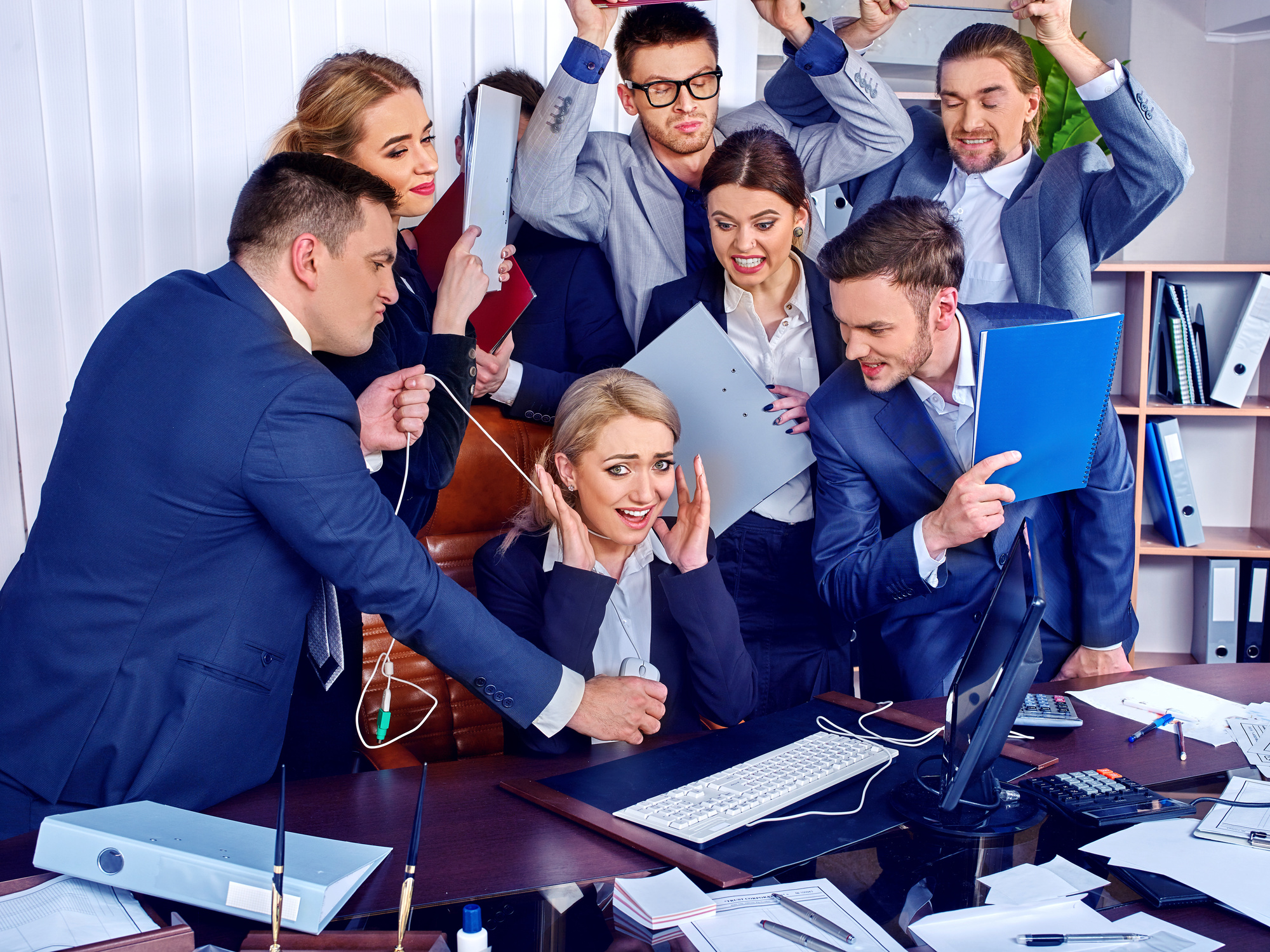 Business mad people office life of team people working with papers sitting table. Conflict new employee and business company. Chief is strangled by employee's wire. Team needs psychological help.